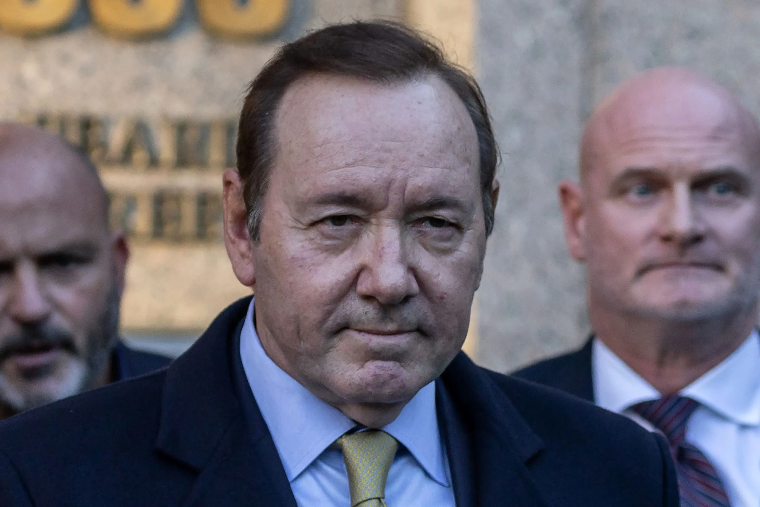 Kevin Spacey Arrives At Southwark Crown Court To Face 12 Sexual Assault Charges, Sporting A Smiling Demeanor
